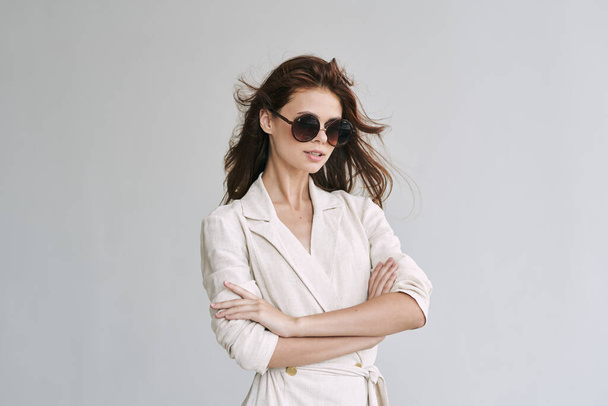 young beautiful woman in sunglasses  posing in studio   - 写真・画像