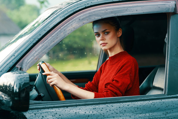 Young beautiful woman driver in the car - Фото, изображение