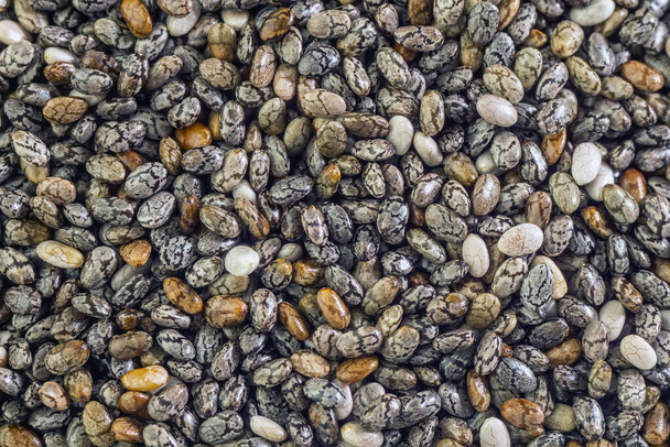 Chia zaden close-up achtergrond macro. De textuur van de Chia zaden. Gezond eten. Kopieerruimte. - Foto, afbeelding