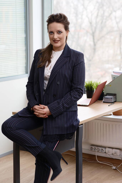 Young business woman dressed in elegant style - Photo, Image