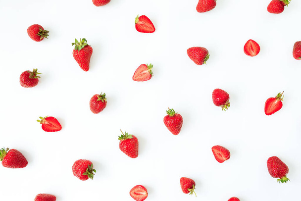Slice strawberry pattern on white background. Flat lay. Top view. Summer sweet berries - Fotó, kép