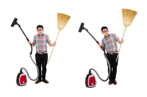 Man with vacuum cleaner and broom on white - Foto, imagen