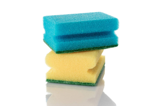 Cleaning products. Colorful, yellow kitchen sponges for foam isolated on white background. Household cleaner service. Clean supplies equipment. - Fotografie, Obrázek