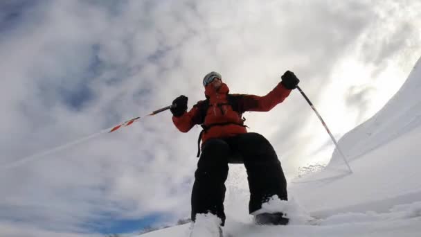Skiing downhill in powder snow. - Footage, Video