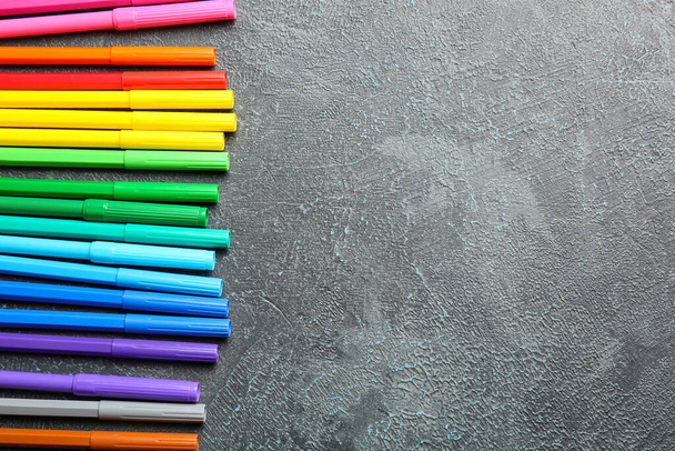 Colorful markers on grey background - Photo, Image