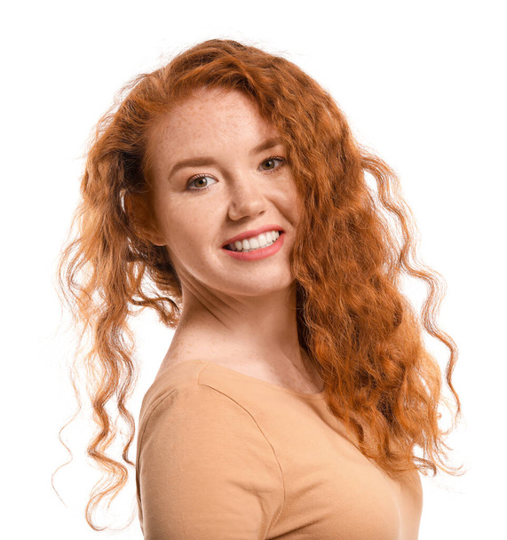 Portrait of beautiful redhead woman on white background - Foto, imagen