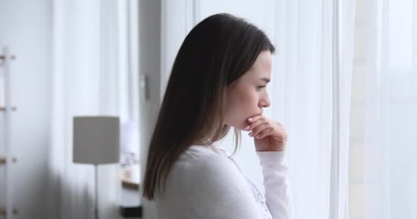 Upset worried young brunette woman thinking of problems. - Video, Çekim