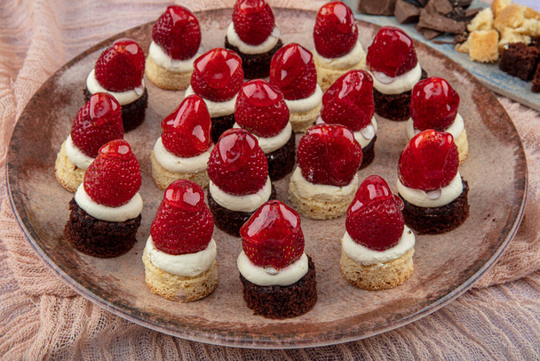 Turkish style pastry products. Strawberry Petifur, Fruit tartolet. - Photo, Image
