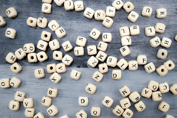 Block of alphabet studded on the floor - Photo, Image