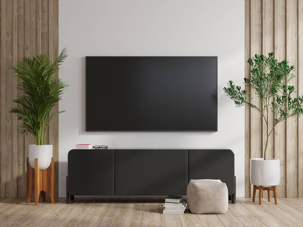 телевізор на стіні і шафа в сучасній вітальні на білому тлі стіни 3d візуалізація
 - Фото, зображення