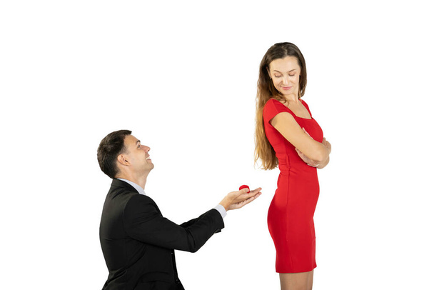Isolated with clipping path. Man asking his girlfriend to marriage. - Foto, Bild
