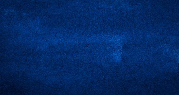 Dark classic blue watercolor background with torn strokes and uneven blurry paint. Abstract background for design, layouts and patterns. - Photo, Image