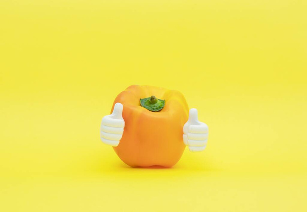 A yellow bell pepper with attached plastic hands doing thumb up - Foto, imagen