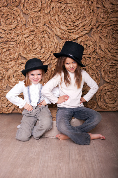 Two girls in black hats - Фото, изображение