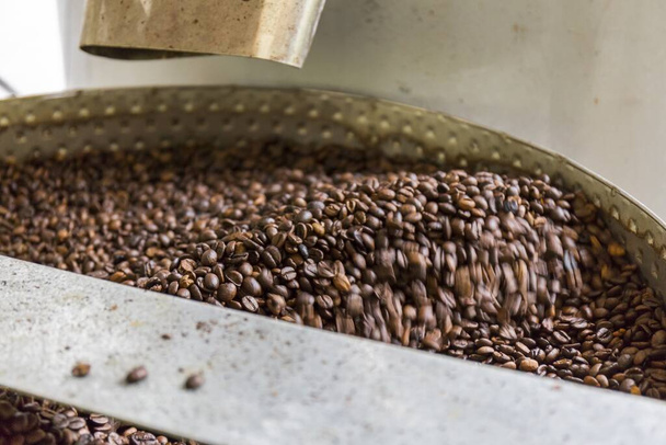 closeup of roasting coffee in motion - Photo, Image