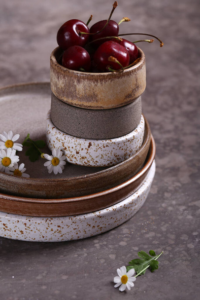 handmade ceramic craft ware on a gray background - Фото, зображення