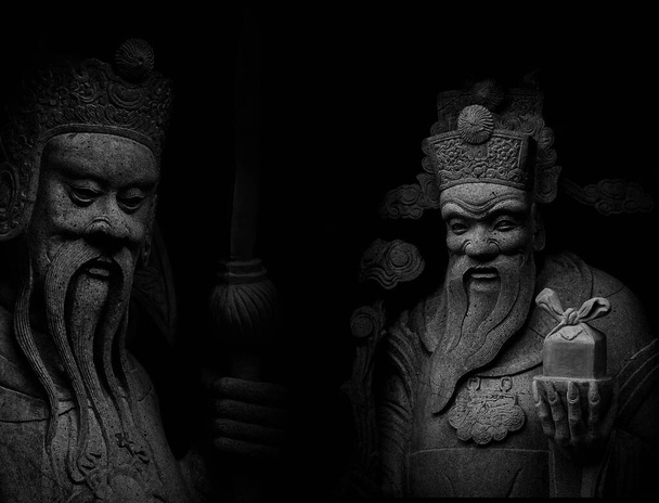 pierre soldat chinois et statue de marchand - Photo, image