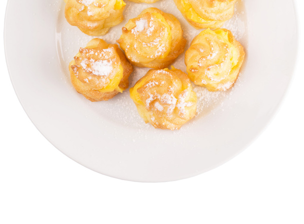 Home made cream puff on a white plate - Photo, Image