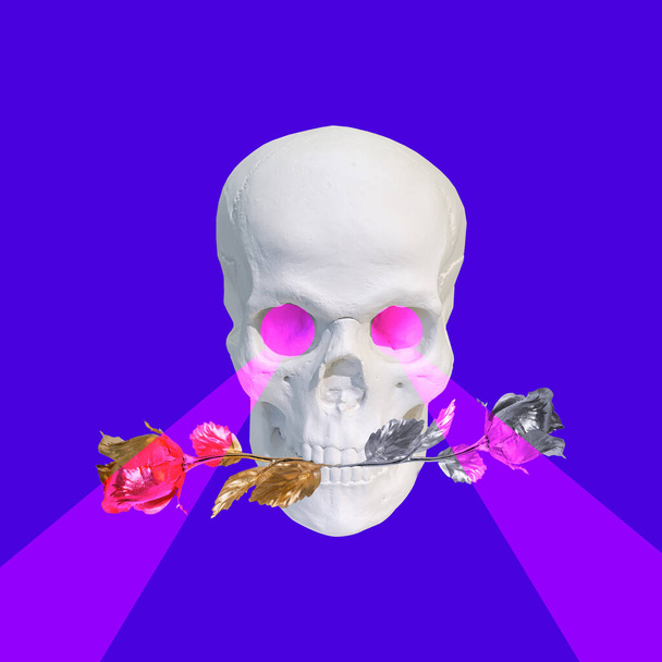Contemporary collage. White skull with roses in teeth and a pink laser from the eyes on a blue background - Photo, Image