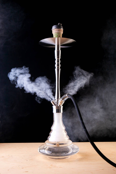 smoking hookah with cloud filled with hot coals... - Fotó, kép