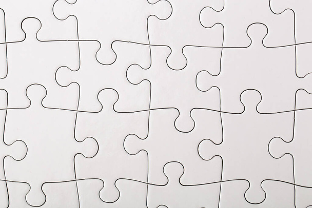 White puzzle on the table - Foto, immagini