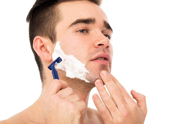 Man shaves his face - Zdjęcie, obraz