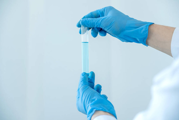 Professional doctors perform testing and analyzing samples of vaccines for immunization prevention and treatment from viral infections. - Photo, Image