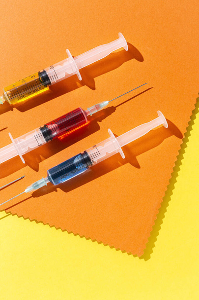 Covid-19- Vaccine vial dose against coronavirus needle syringe, medical concept vaccination hypodermic injection treatment disease care hospital prevention, immunization - 写真・画像