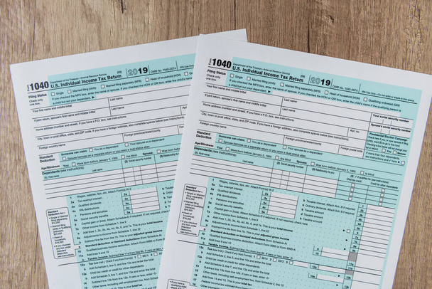 1040 tax form close up on desk. tax time. taxes concept - Foto, immagini