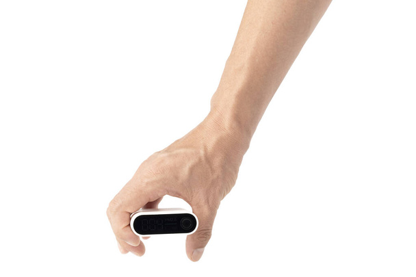 mão segurando PM 2.5 Detector no fundo branco
 - Foto, Imagem