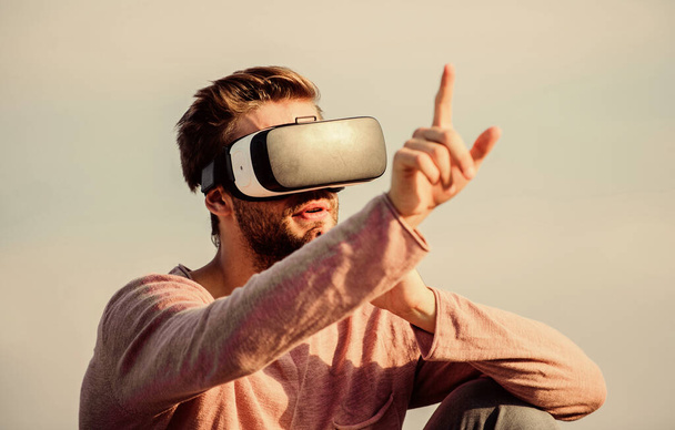 New reality is here. guy virtual reality. create own business. Digital future and innovation. male reality. looking so modern. sexy man sky background vr glasses. macho man wear wireless VR glasses. - 写真・画像