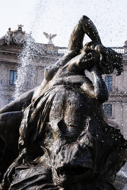 Statue of naked woman in the fountain of the Republic Square in Rome, Italy - Photo, Image
