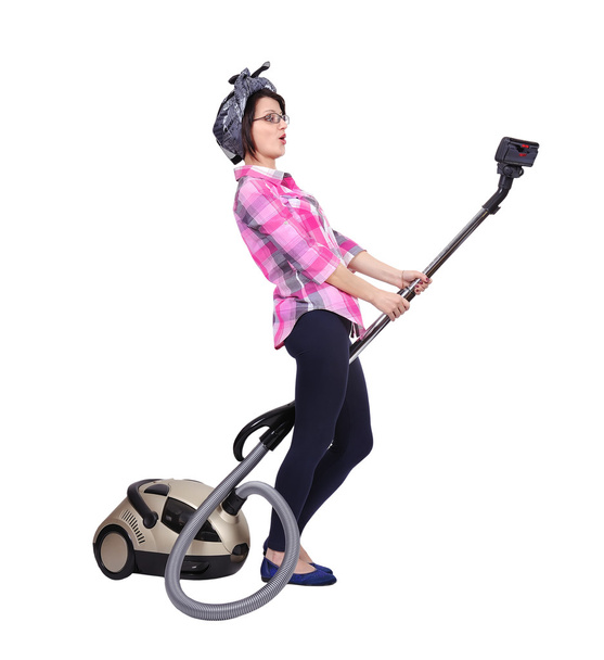 woman using vacuum cleaner - Foto, immagini