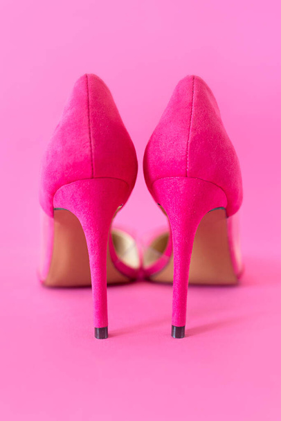 stylish pink high heels shoes on pink background. Shoes, fashion, style, shopping, sale concept - Photo, Image