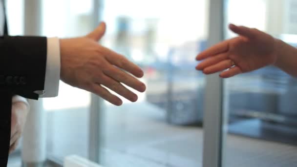 business man and woman shaking hands. Close-up of businesspeople shaking hands. business couple shaking hands at the office. - Footage, Video