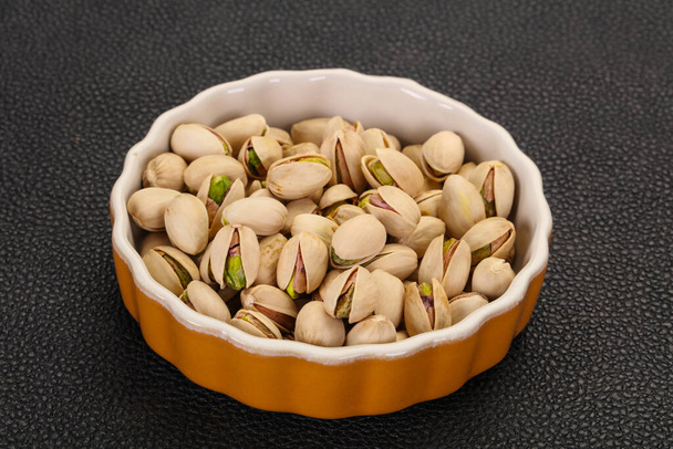 Montón de nueces de pistacho en el bowl - Foto, Imagen