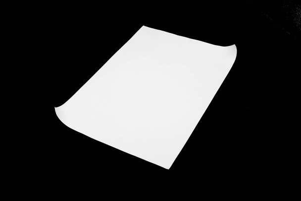 white paper isolated on black background - Photo, Image