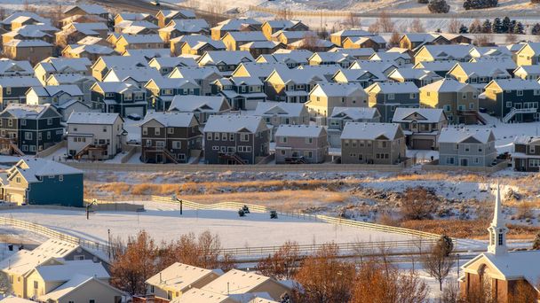 Panorama Homes and church in snow covered Utah Valley neighborhood in winter - Photo, Image