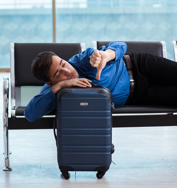 Man wairing to boarding in airport lounge room - Foto, imagen
