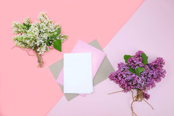 Abstract Floral composition flat lay, background, minimum holiday concept, banner of spring. Creative modern bouquet with a lilac. Greeting card for mother's day, happy birthday, wedding - Photo, image