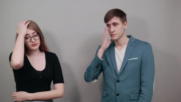 Forgetful holding hand to hair, touches head forgot something important regrets - Footage, Video