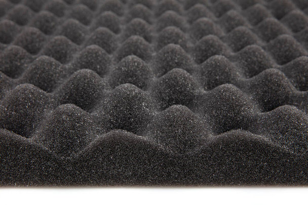 A poliuretán hab hangszigetelt paneljének mintázata. - Fotó, kép