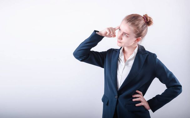 Portrait of Business Woman in Doubting Confused Emotion on Isolated White Background, Businesswoman in Confuse Puzzled Expression While Thinking Solution. Confusion Puzzled and Asking Concept - Foto, Imagem