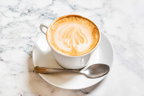 cup of cappuccino on the marble background - Foto, imagen
