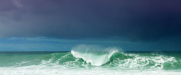 Briser les vagues
 - Photo, image