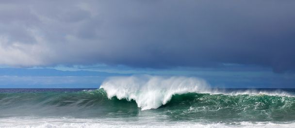 Briser les vagues
 - Photo, image