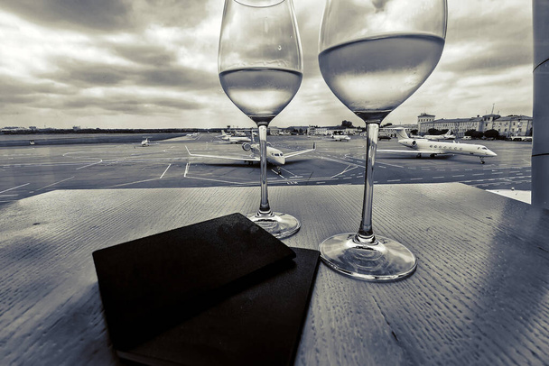 Wine at the airport awaiting flight - Photo, Image