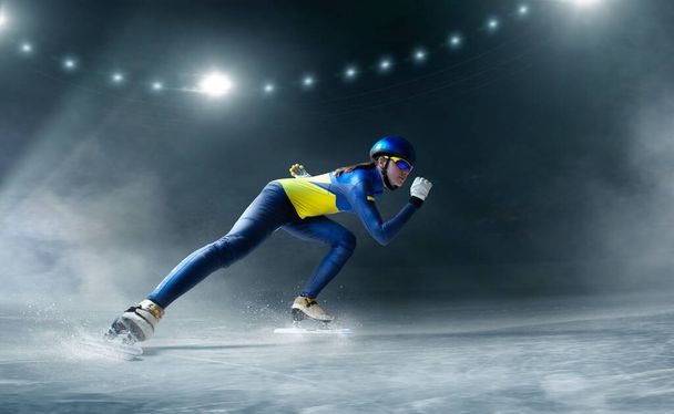 Short track speed skating female athlete. - Photo, Image
