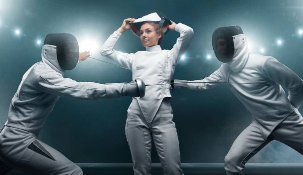 Young male and female fencing athletes. - Photo, Image