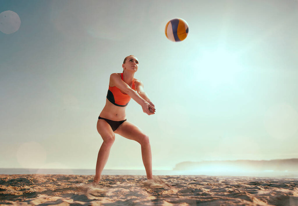 Woman playing beach volleyball. - Photo, Image
